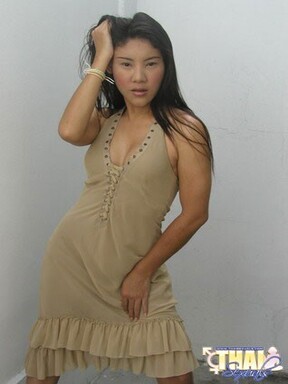 Asian shemale Angel posing in dress and high heels