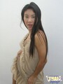 Pulling hem of dress over bare thighs