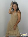Standing with feet planted wide apart hand in hair