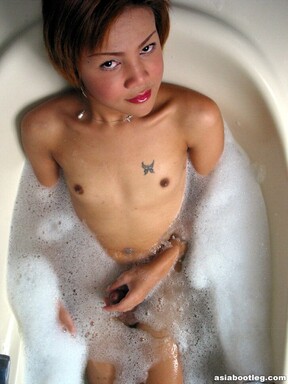 Asian shemale Sonya masturbating in bath
